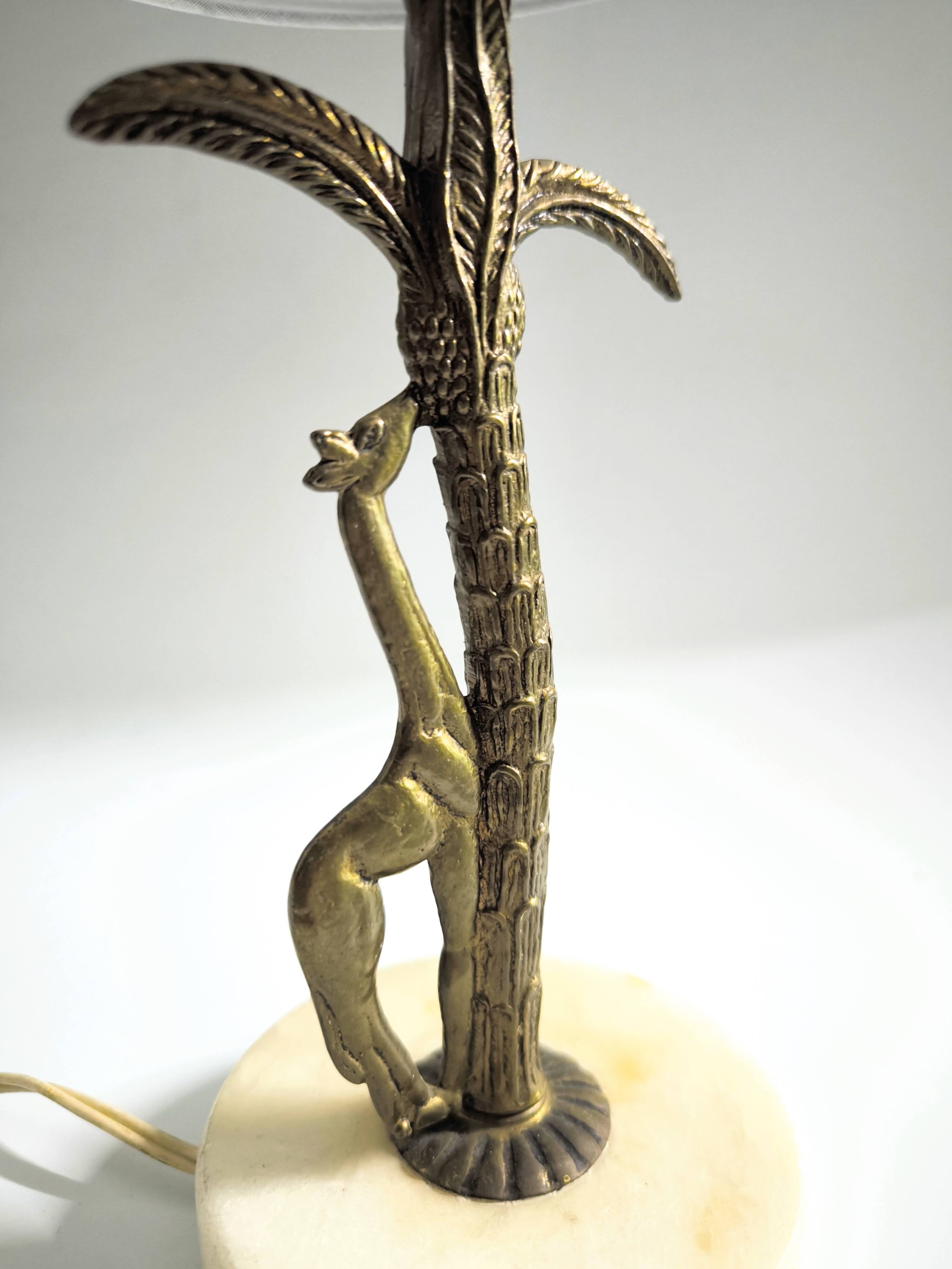 Bronze and marble lamp in Hollywood Regency style.