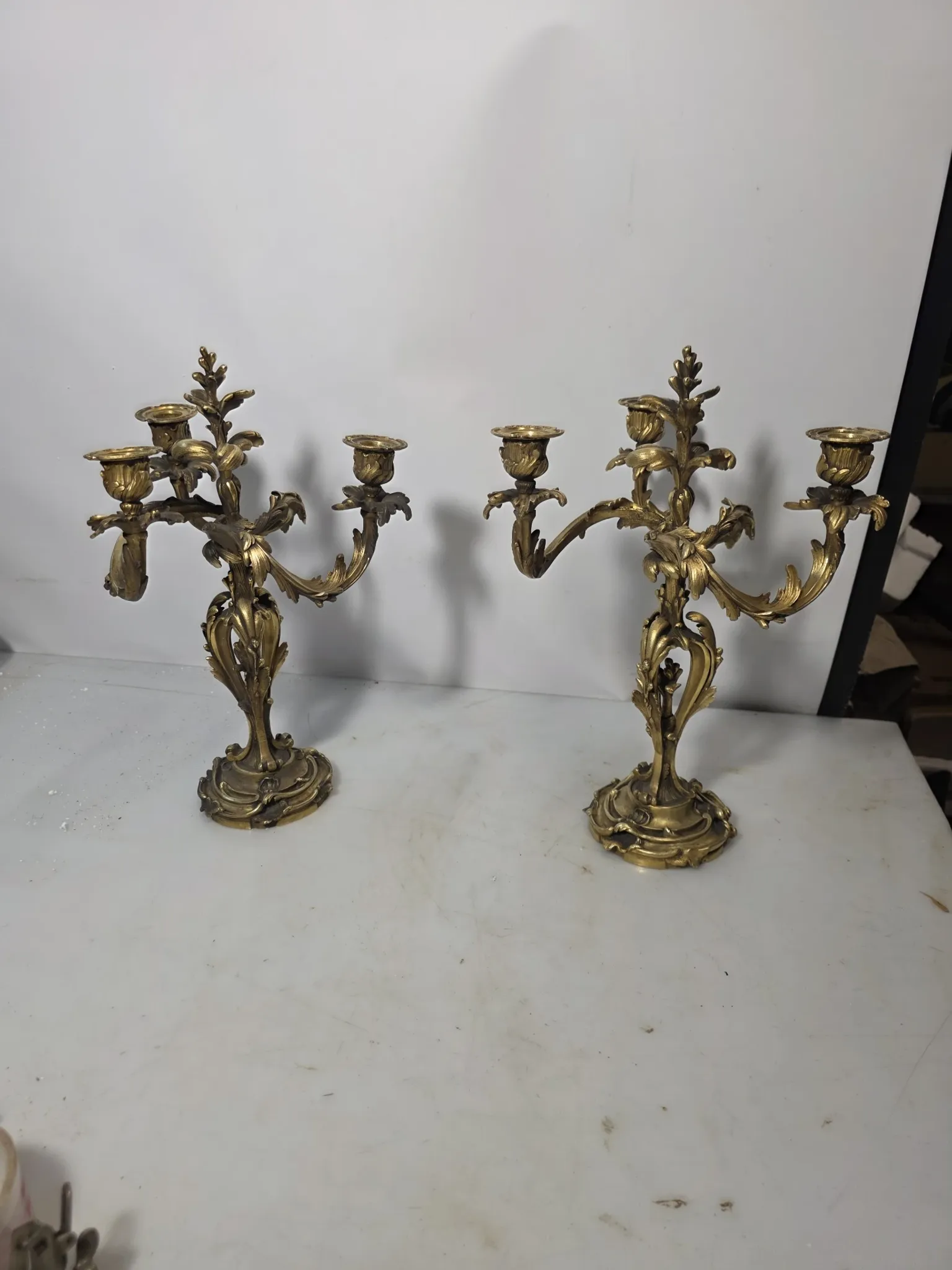 Pair of Louis XV style bronze candlesticks from the 19th century.