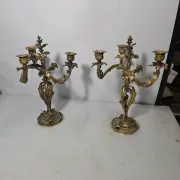 Pair of Louis XV style bronze candlesticks from the 19th century.
