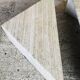 Pair of triangular coffee tables in travertine, Italy circa 70 / 80