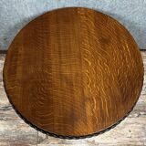Hammered iron coffee table with circular wooden top