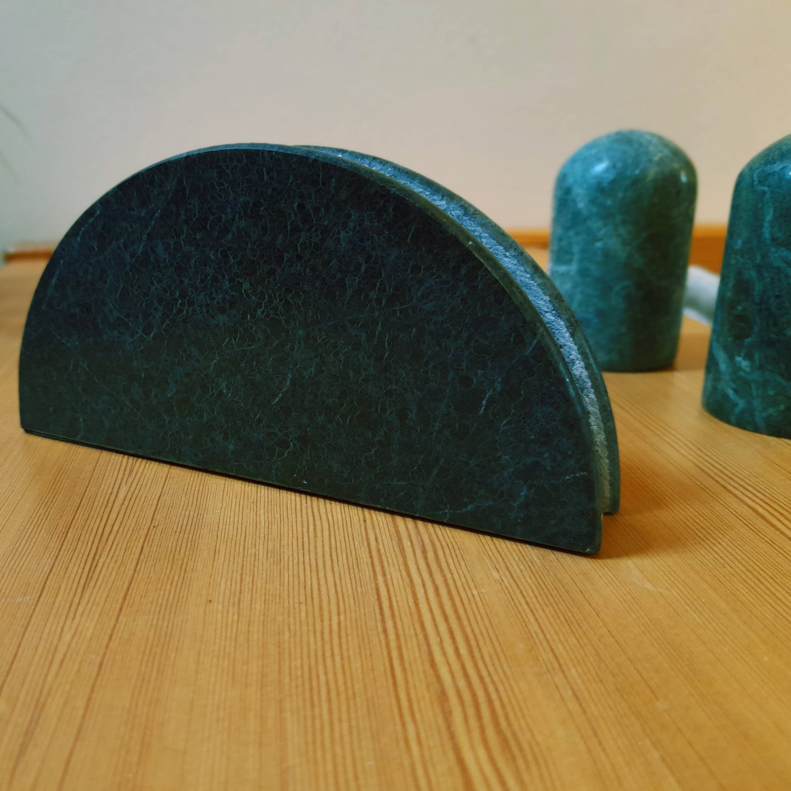 Trio of salt shakers, pepper shakers and napkin holders in green marble