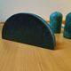 Trio of salt shakers, pepper shakers and napkin holders in green marble
