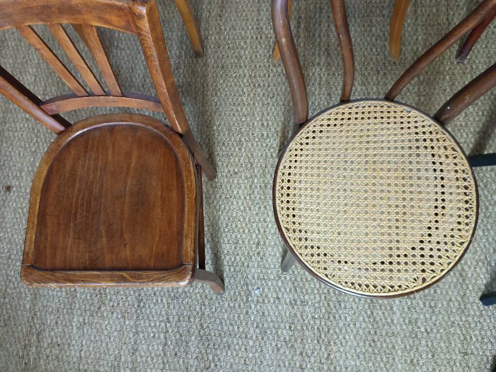 Set of 8 mismatched vintage bistro chairs