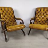 Pair of padded Chesterfield armchairs