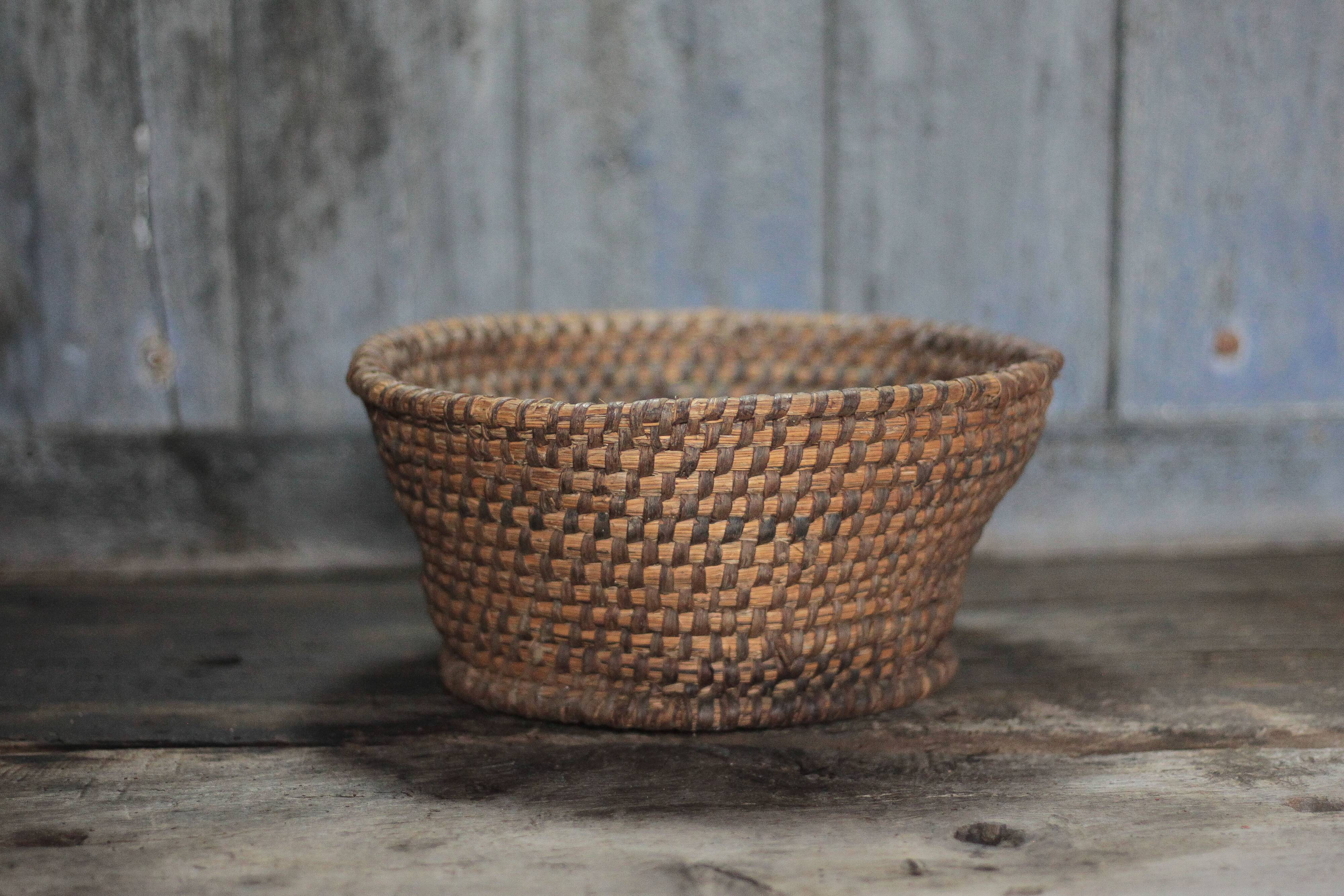 Old wicker basket, straw and bramble, woven basket, countryside, chal.
