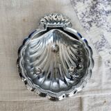 Vintage shell pocket emptier in shiny silver metal