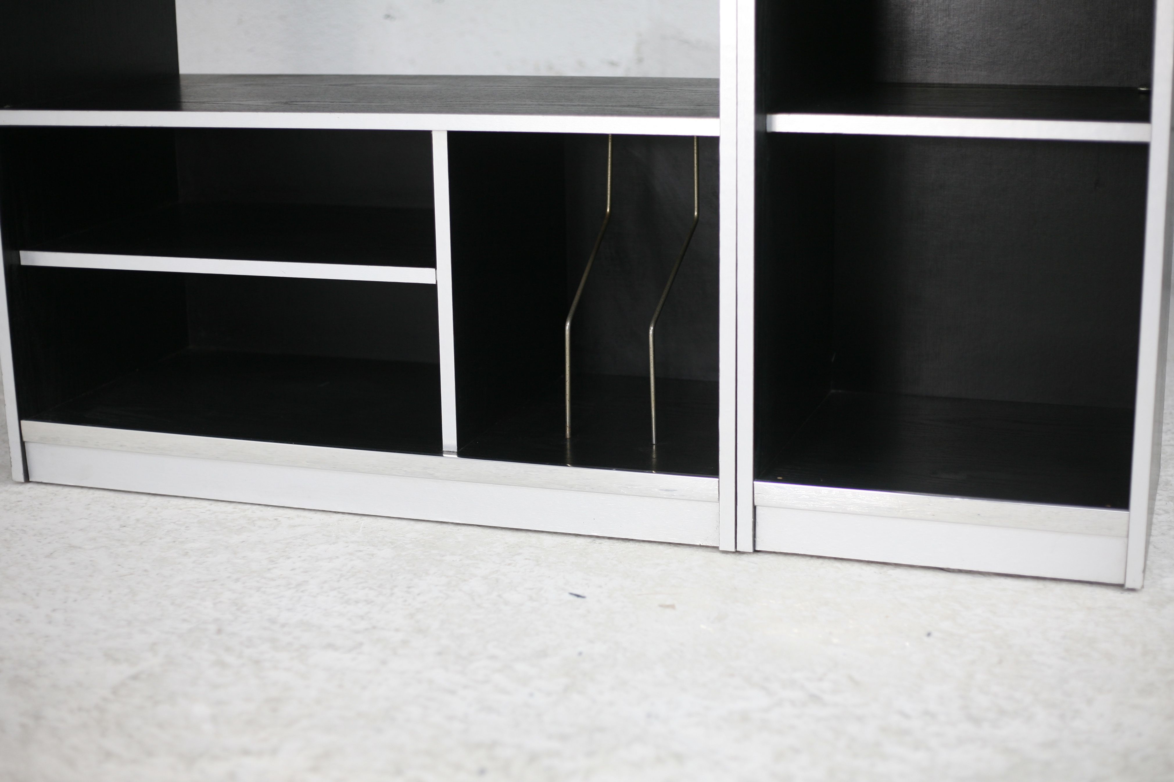 Storage cabinet wood compressed lacquered black lining margins aluminum. France, circa 1975.