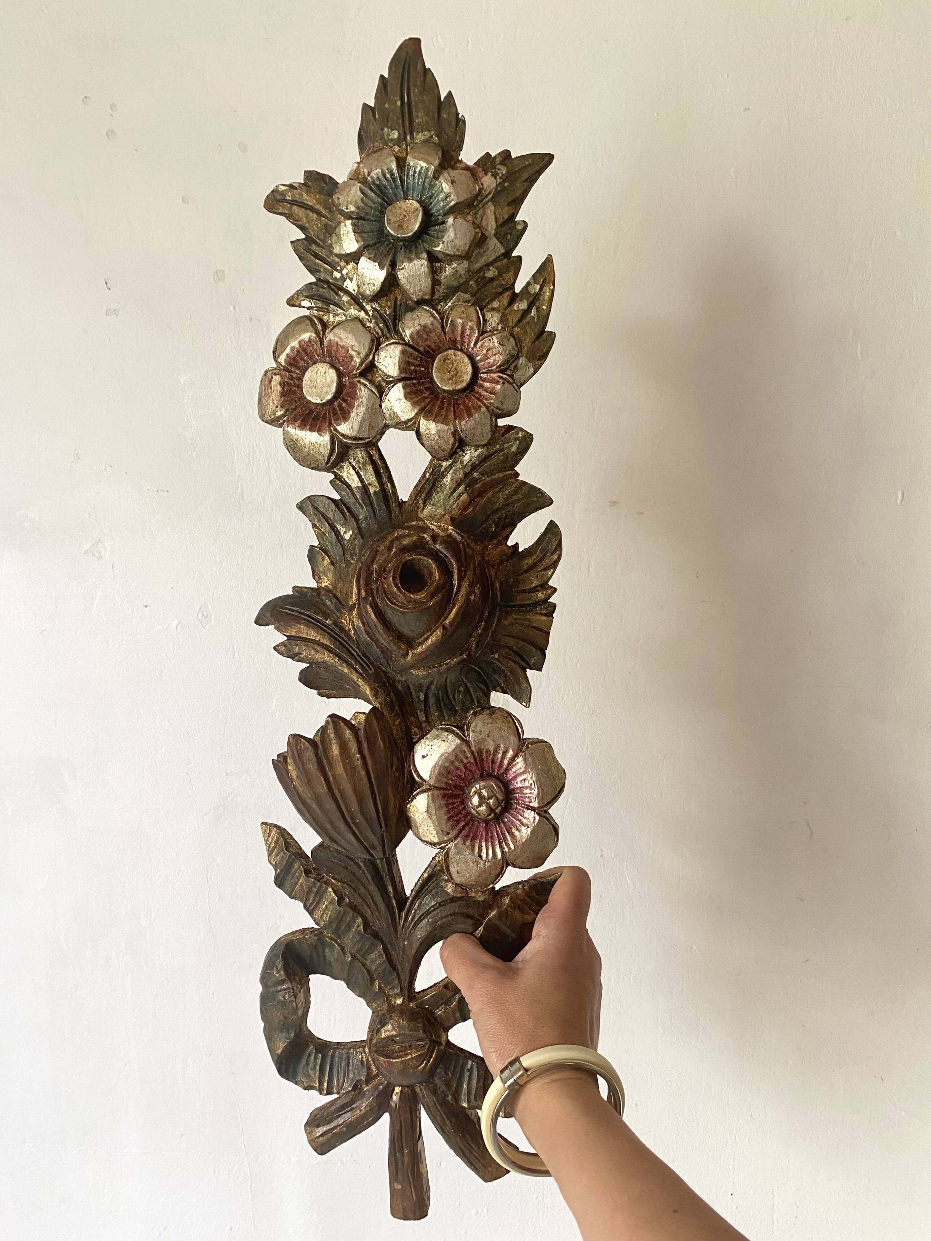 Decorative carved wooden ornament bouquet flowers and ribbon