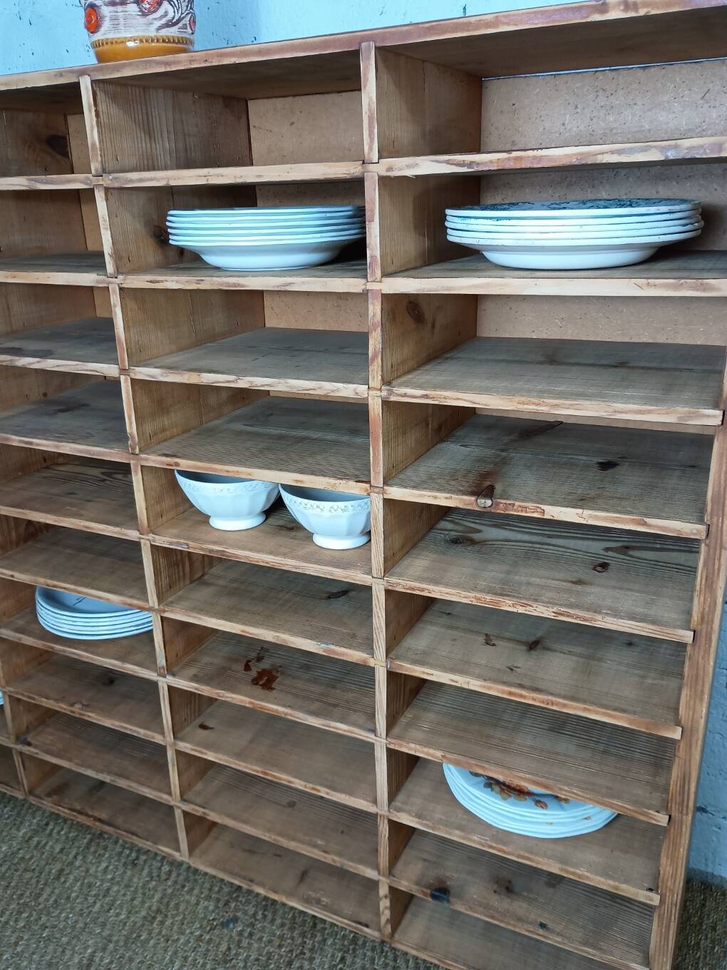 Wooden sorting cabinet with 50 compartments.