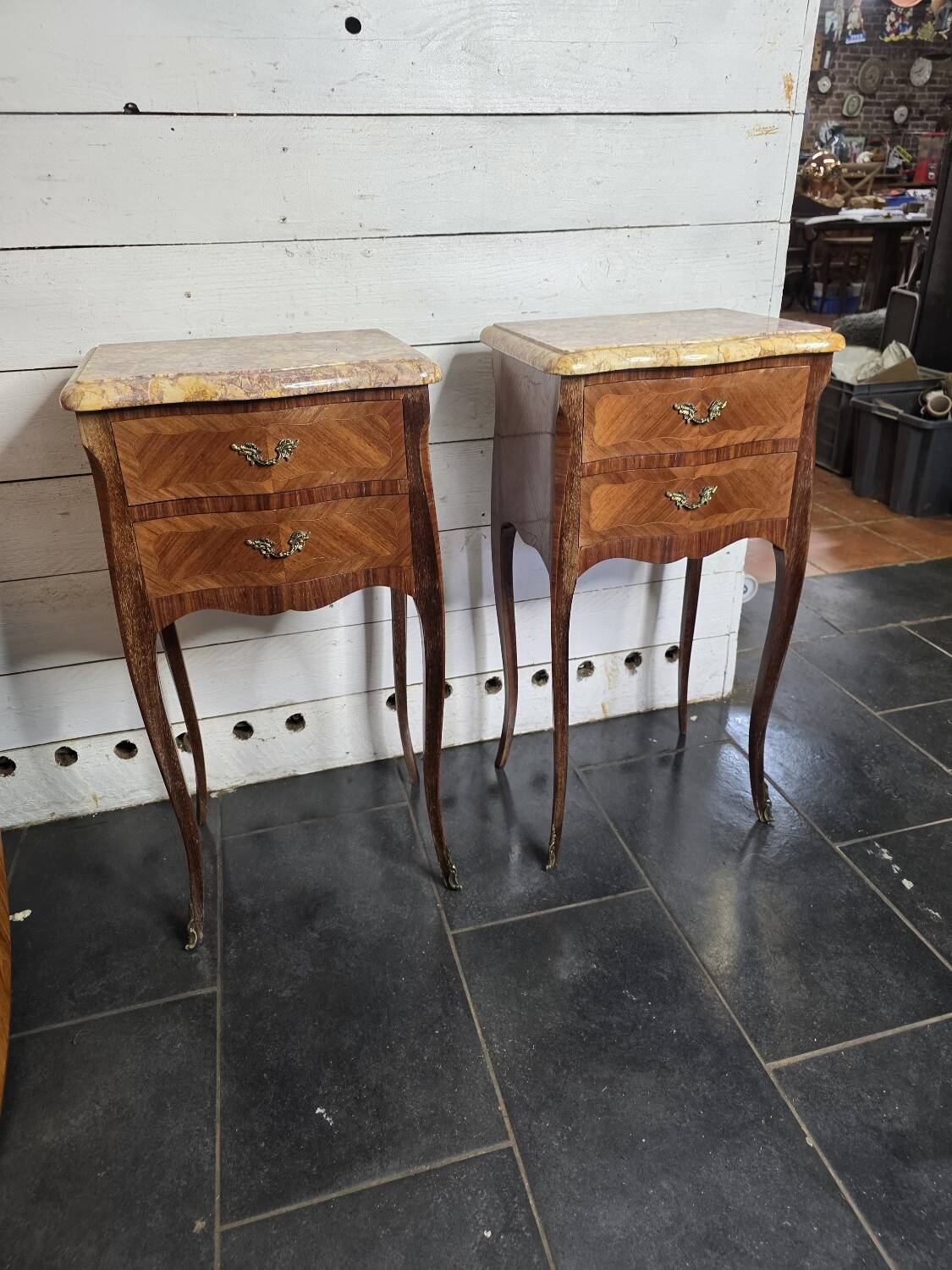 Pair of Louis XV style curved bedside tables in marquetry