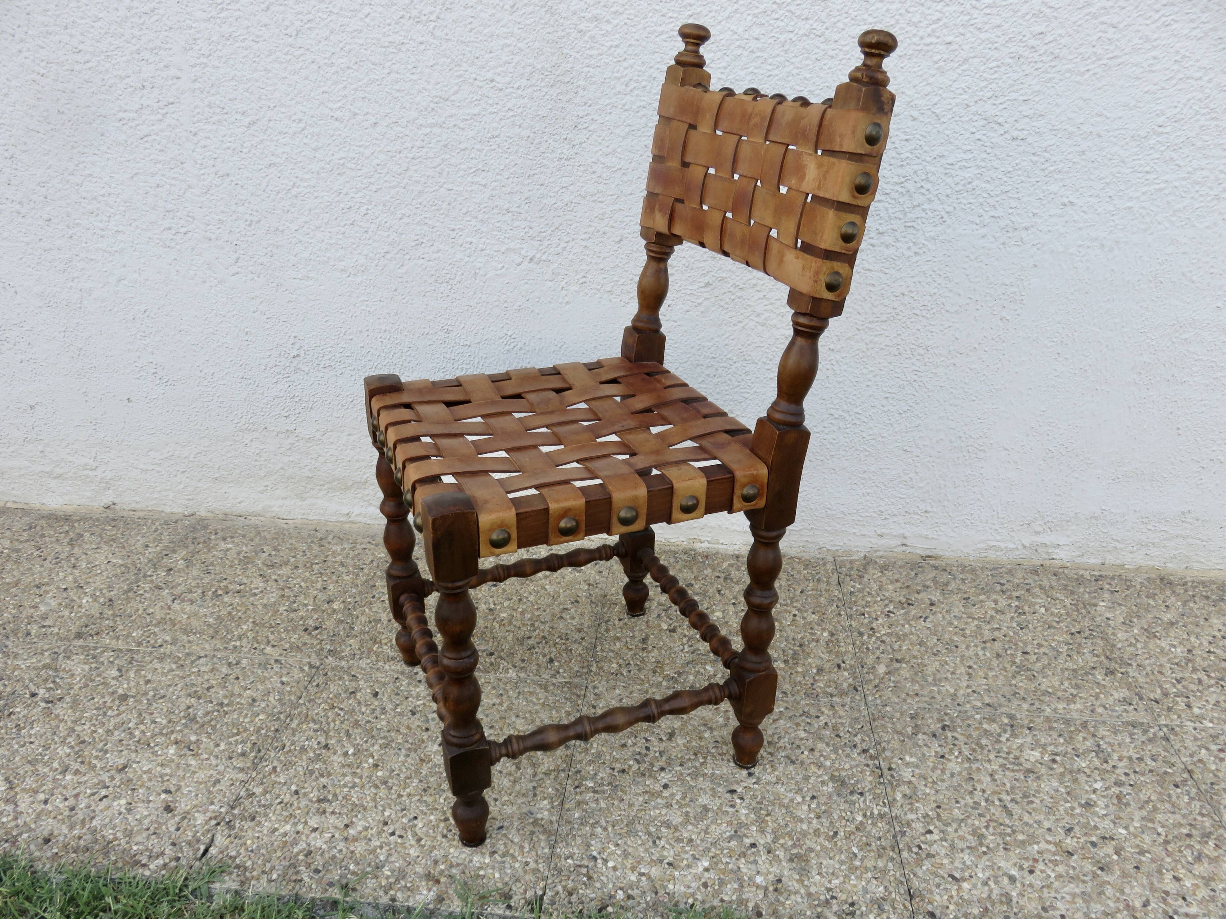 Spanish chair in oak with thick cognac leather straps, 1940s.