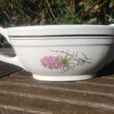 Porcelain gravy boat from the Orchies Moulin des Loups earthenware factory with lilac decoration