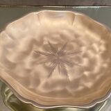 Metal dish with starry decoration