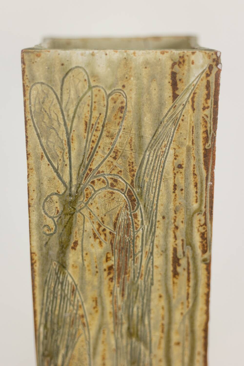 Brutalist stoneware vase with a floral design. 1970s.