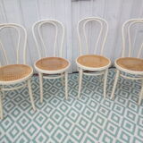 Lot of 4 bistro chairs in caned wood