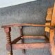 Vintage armchair in straw and brutalist wood