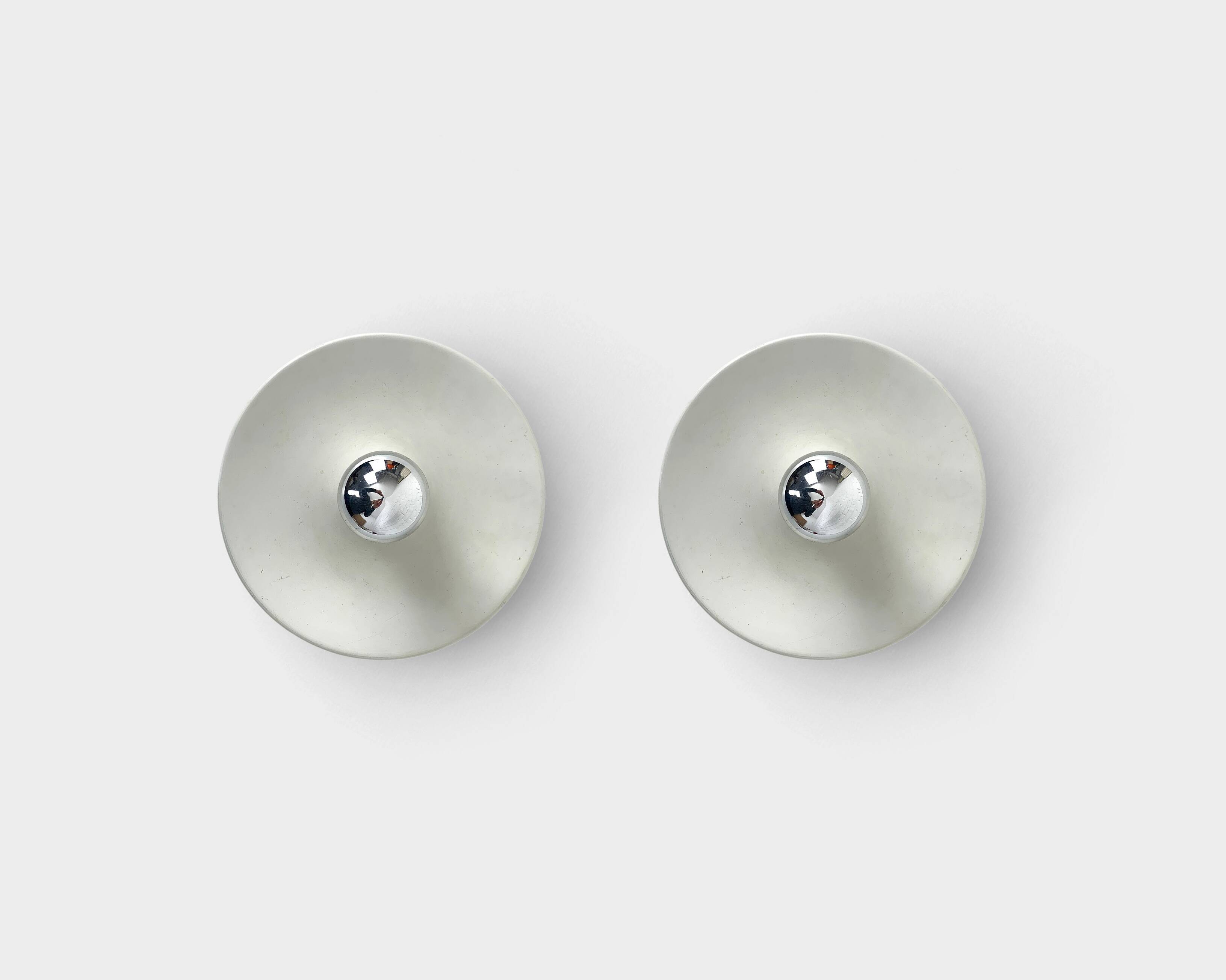Pair of wall lights selected by Charlotte Perriand, Germany 1960