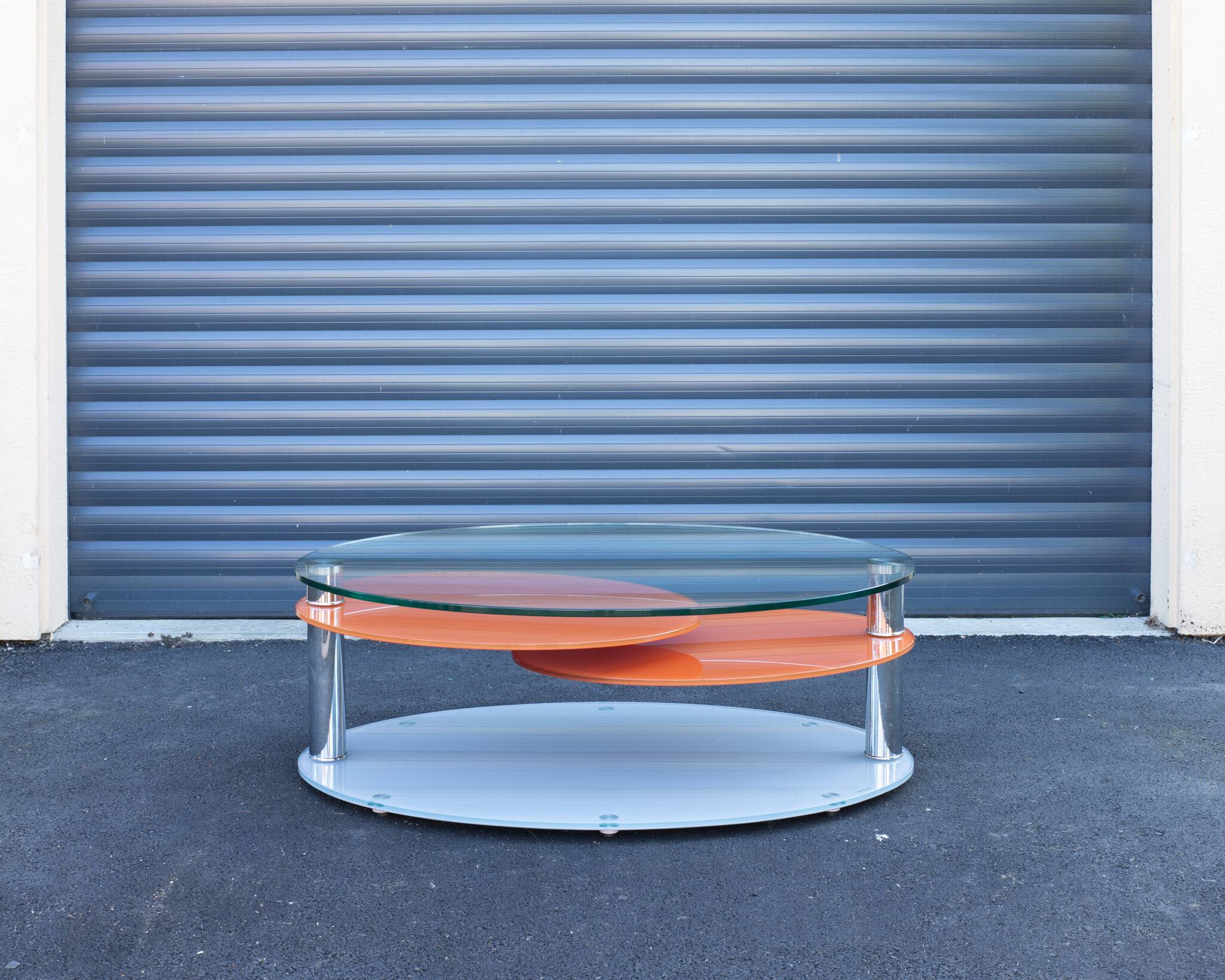 Antoine Motard designer swivel tempered glass coffee table