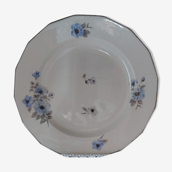 Round white porcelain dish with blue and black anemones pattern