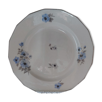 Round white porcelain dish with blue and black anemones pattern