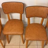 Set of 4 vintage chairs, in beech and imitation leather.