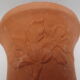 Duo of decorated terracotta wall flowerpots