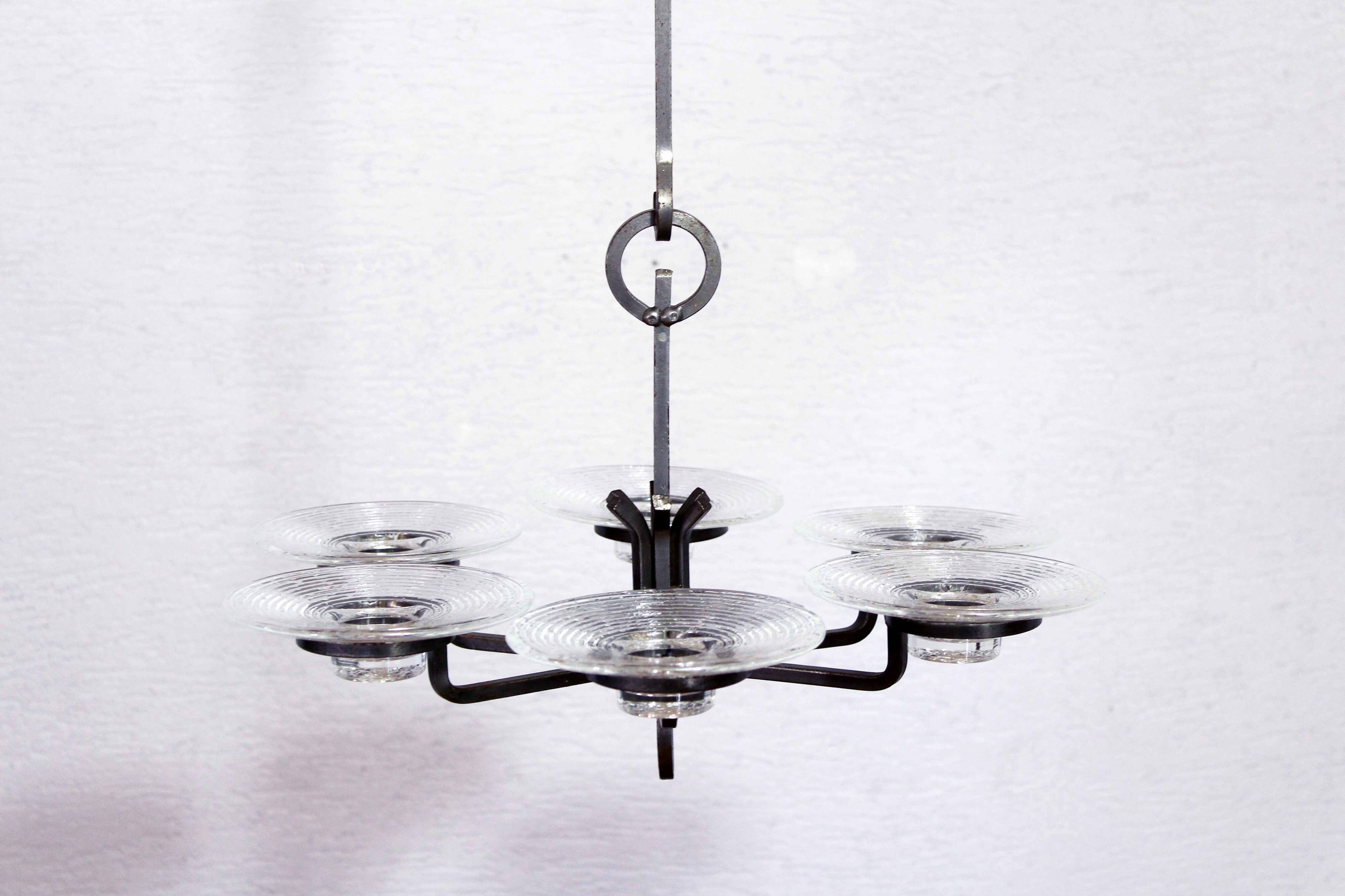 Art deco iron and glass candlestick by erik höglund
