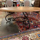 Round wood and wrought iron coffee table