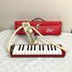 Vintage wind instrument Melodica Hohner piano 26