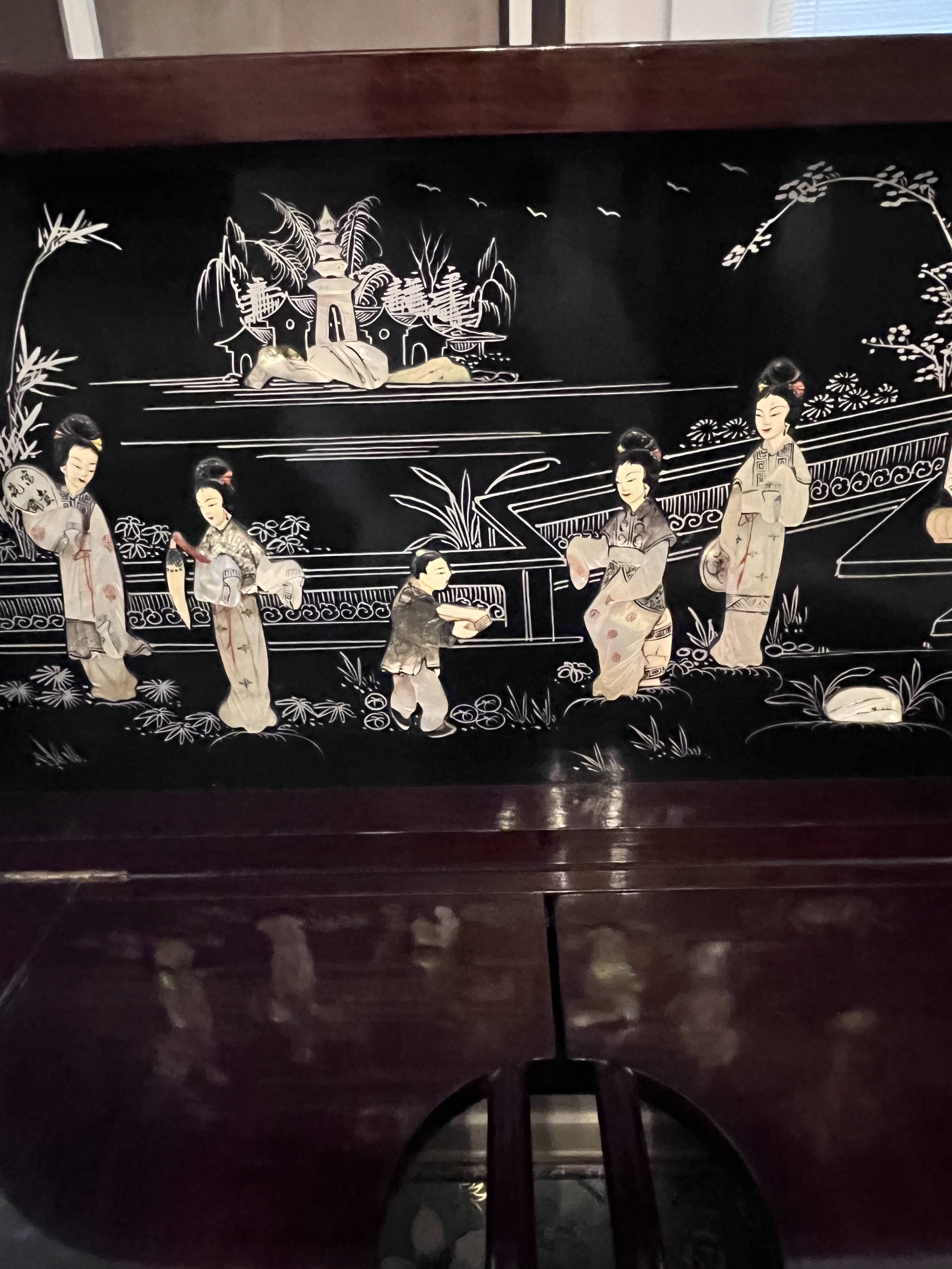 "Chinese black lacquer cabinet, mother-of-pearl inlays, court scenes"