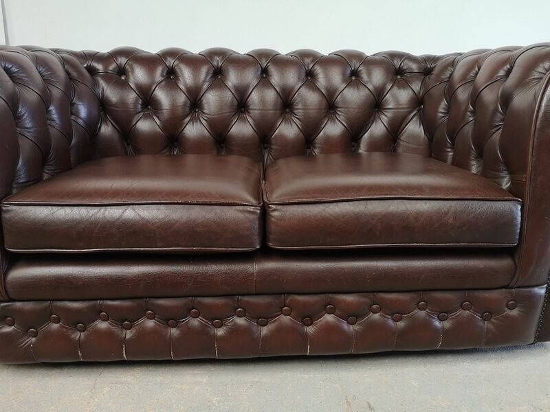 Brown leather chesterfield sofa two places
