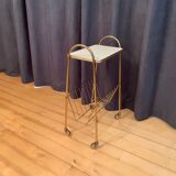 Mobile newspaper holder, 1960s