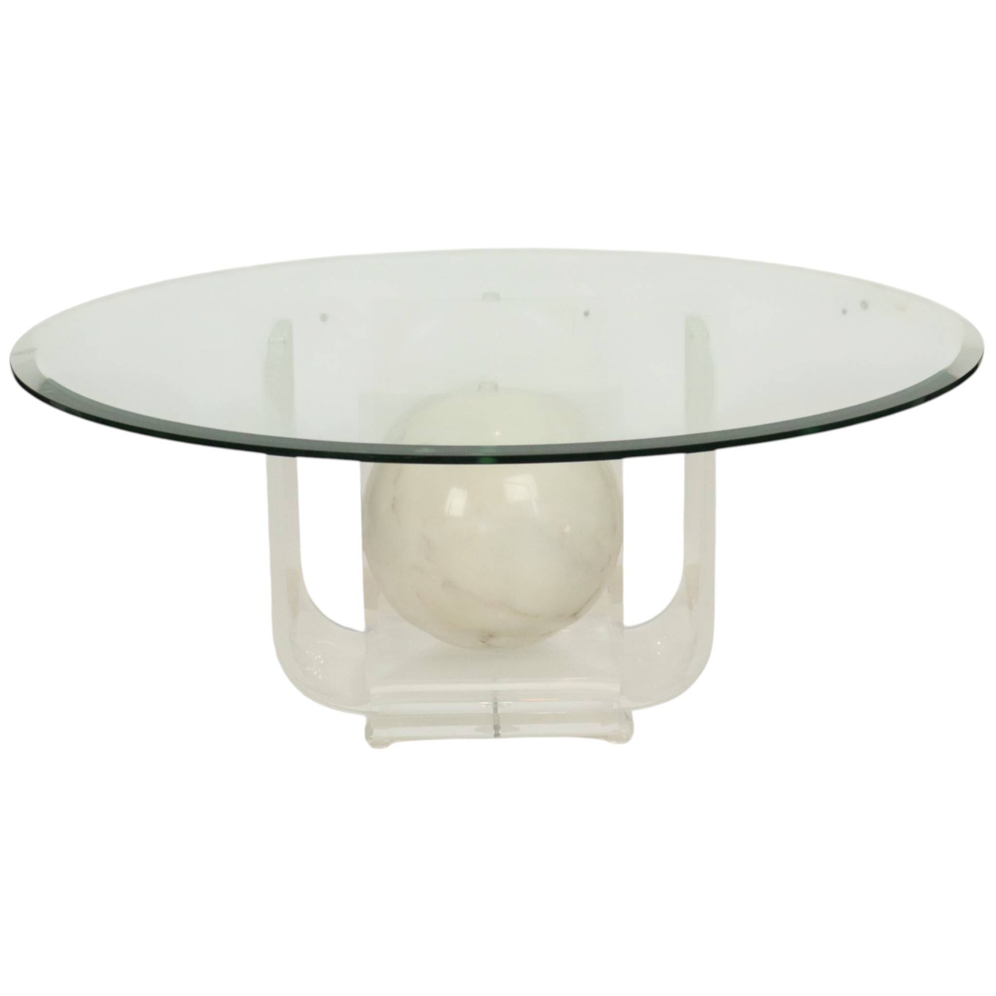 Vintage round coffee table in lucite and marbled glass.