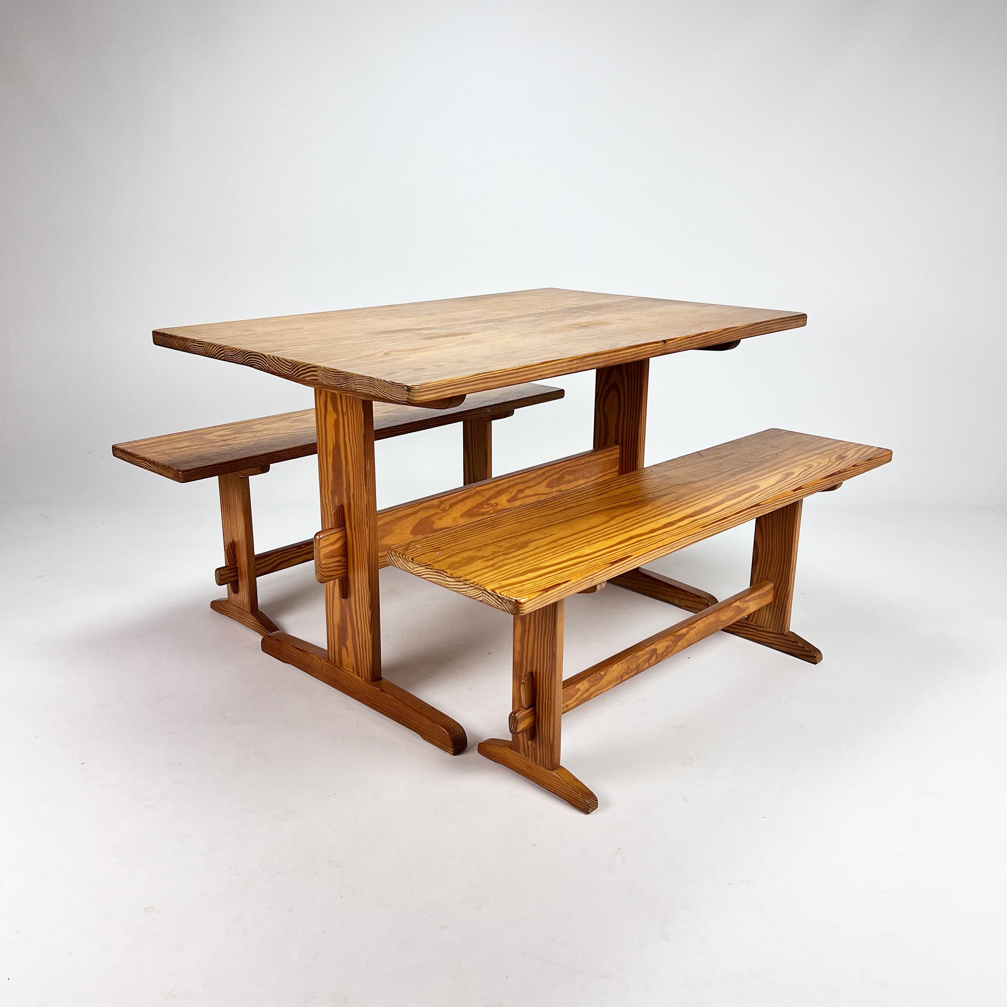 Mid century scandinavian pine dining set consists of one table and two benches, 1960s