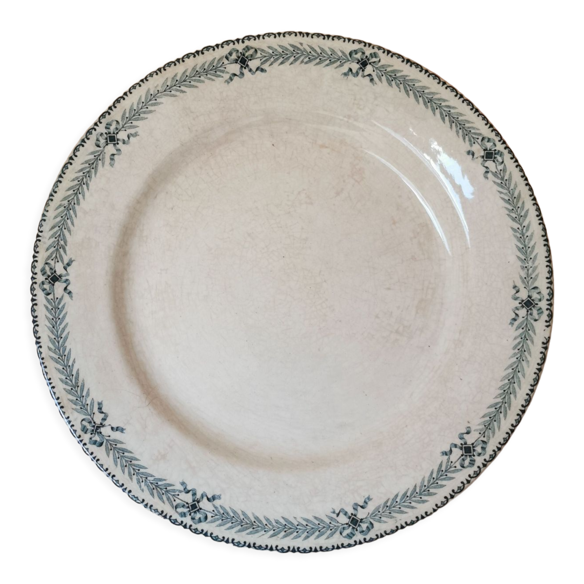 Large old round plate in iron earth