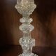 pair of cut glass candlesticks with lion and ram head decor, late 19th century