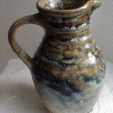 Enamelled ceramic pitcher, signature mb the terminal