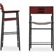 By contemporary classic bar stool with cognac leather backrest, black rubber, metal.