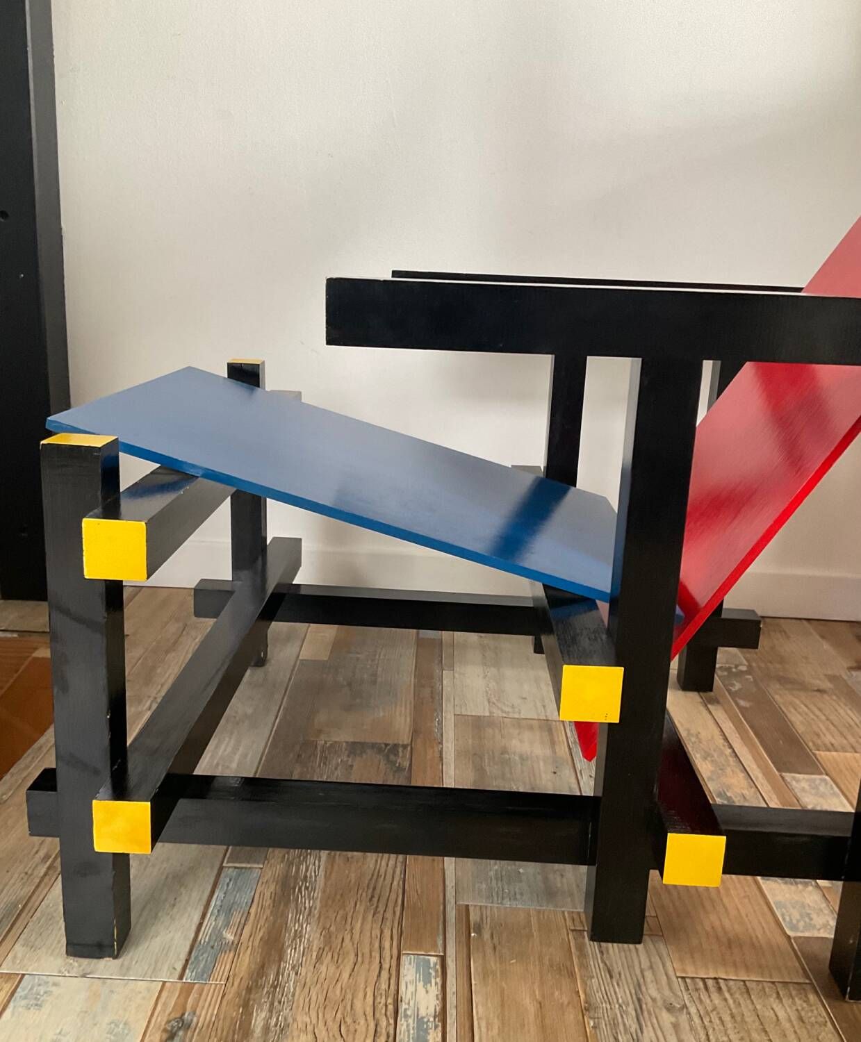 “Red and blue” lounge chair in the style of Gerrit Rietveld