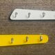 Duo of asymmetrical Formica coat racks from the 60s
