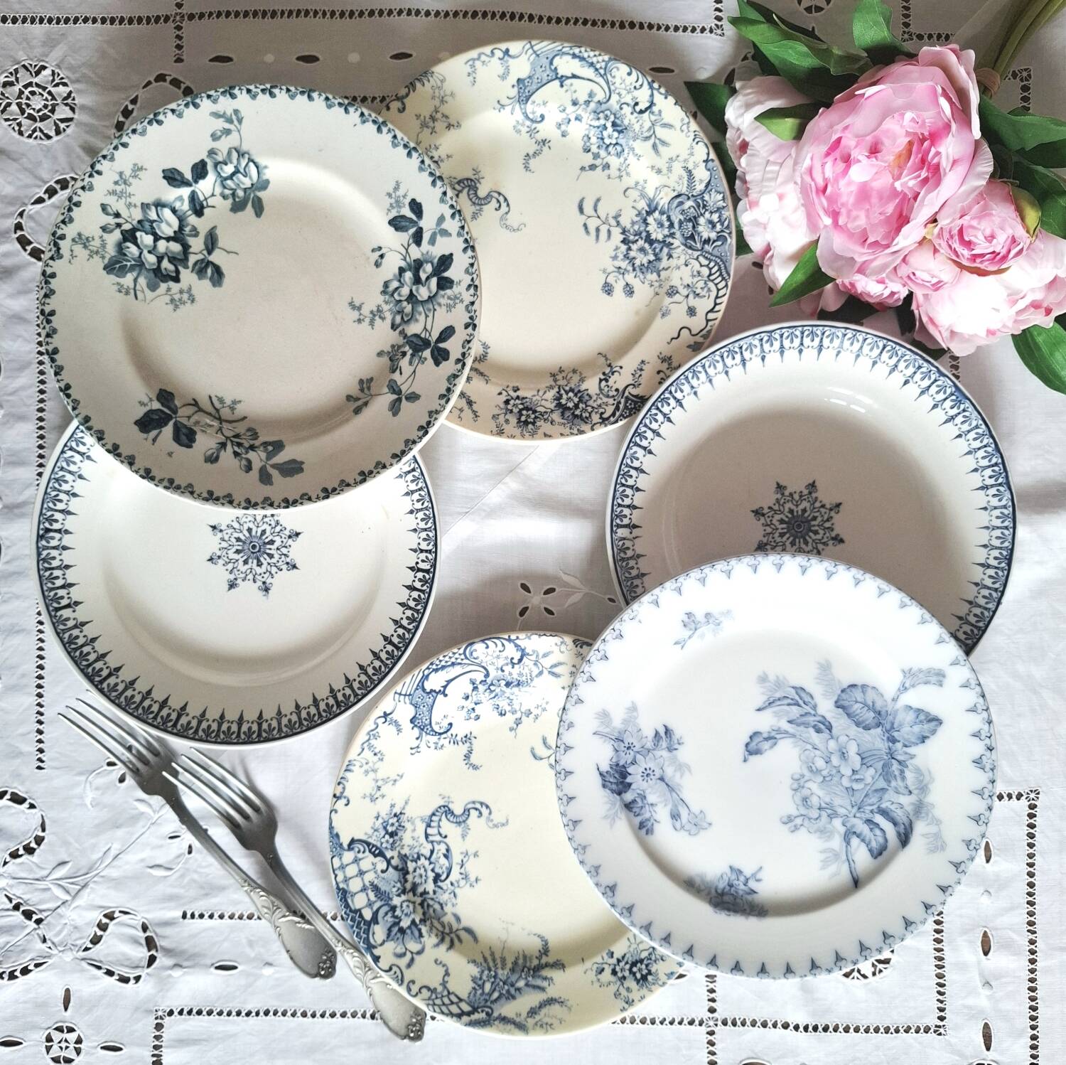 Mismatched antique ironstone dinner plates
