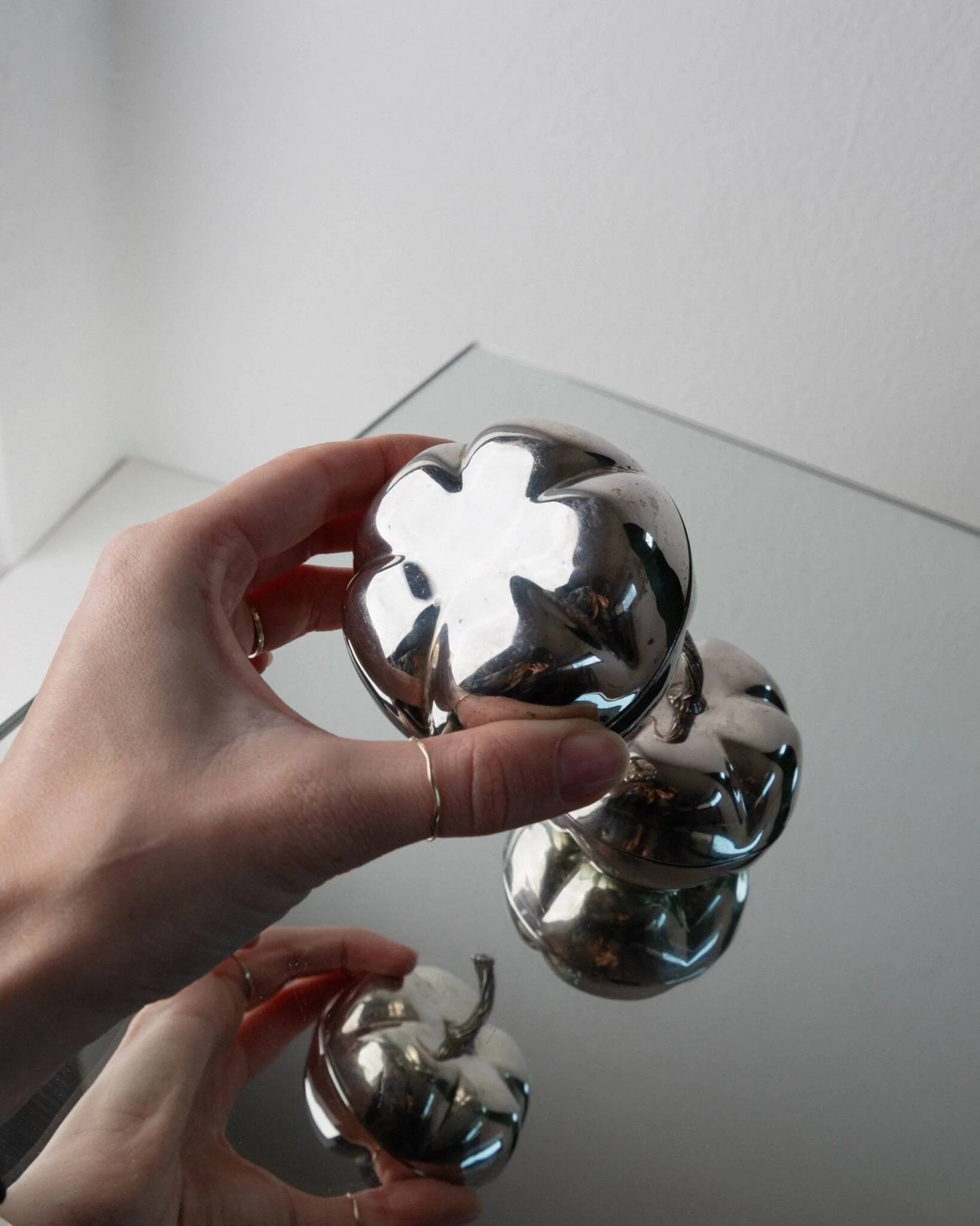 Silver-plated vintage Christian Dior Pumpkin set: two lidded metal bowls with removable integrated lighter, 1970s