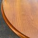Round side table with a central solid wood leg from the 20th century.