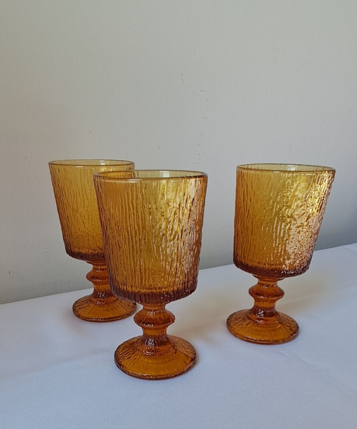 3 textured amber stemmed glasses. Vintage.