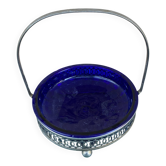 Vintage table basket in cobalt blue glass with a silver metal frame.