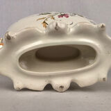 Planter of oblong shape on foot