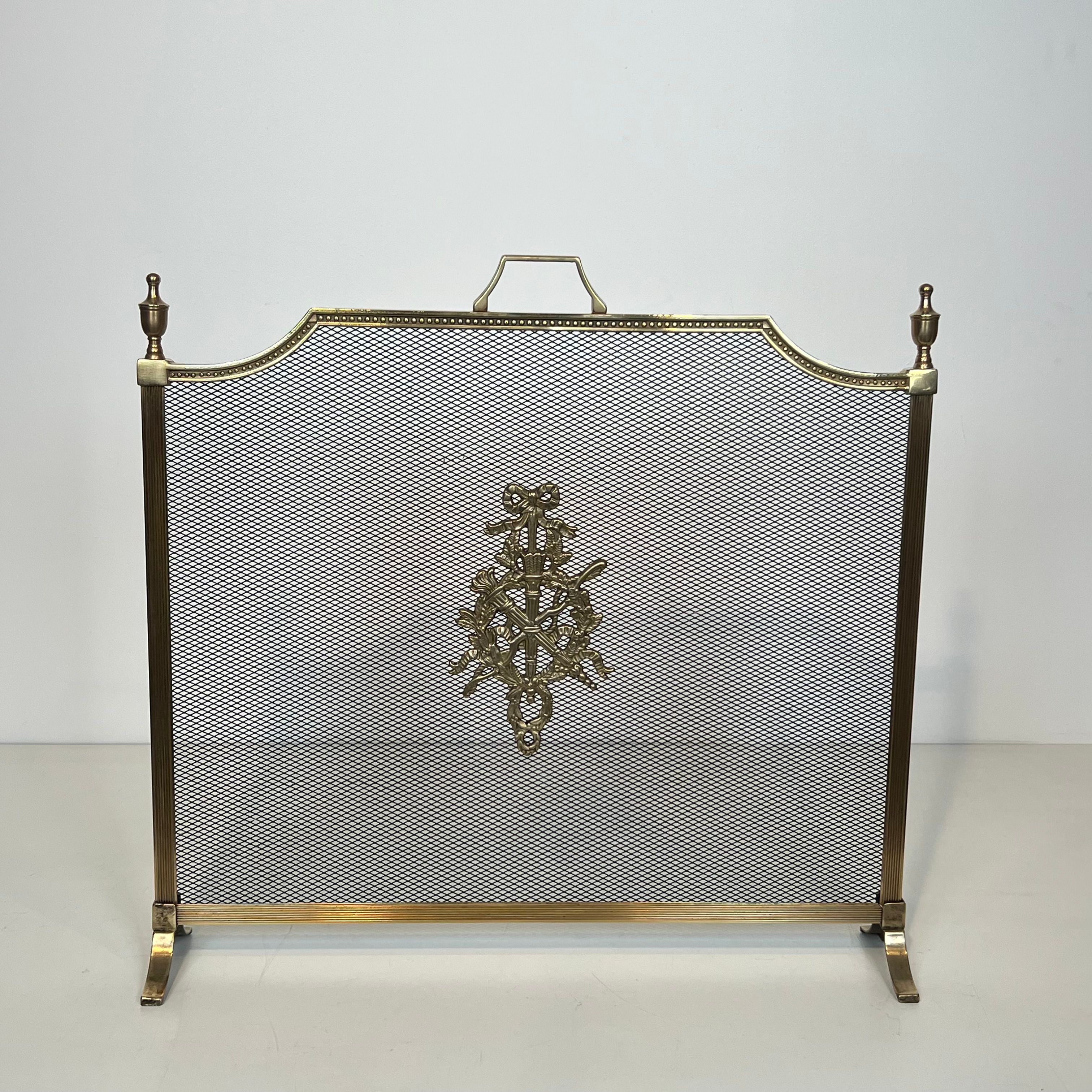 Brass fire screen and grille in the Louis XVI style in the taste of Maison Jansen.