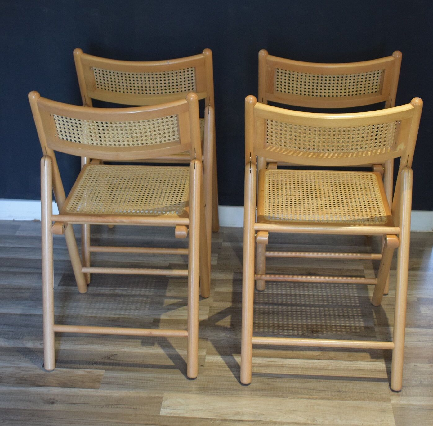 Canned vintage folding chairs