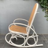 Old rocking chair with white patina